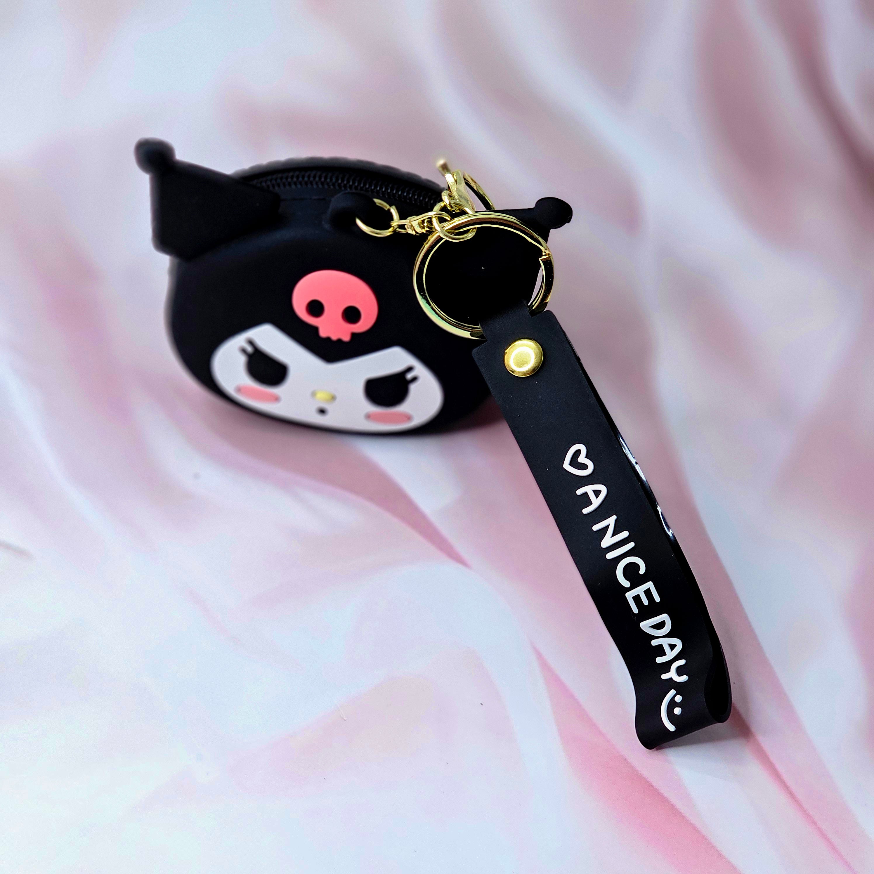 Durable silicone Tom character coin purse and keychain, a unique accessory for kids' bags or keys, combining style and utility. www.usmile.com
